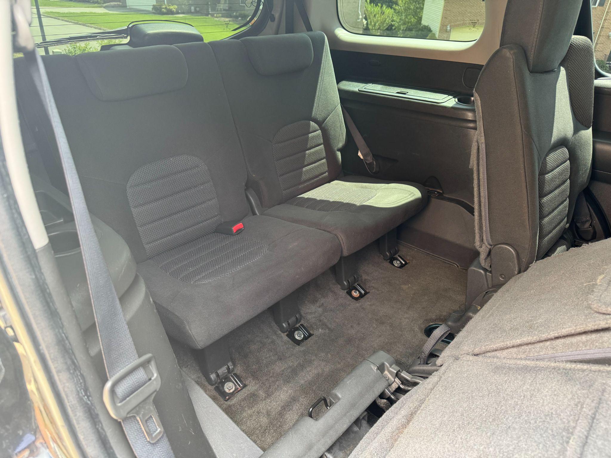 Nissan Pathfinder third row shampooed and vacuumed after detailing