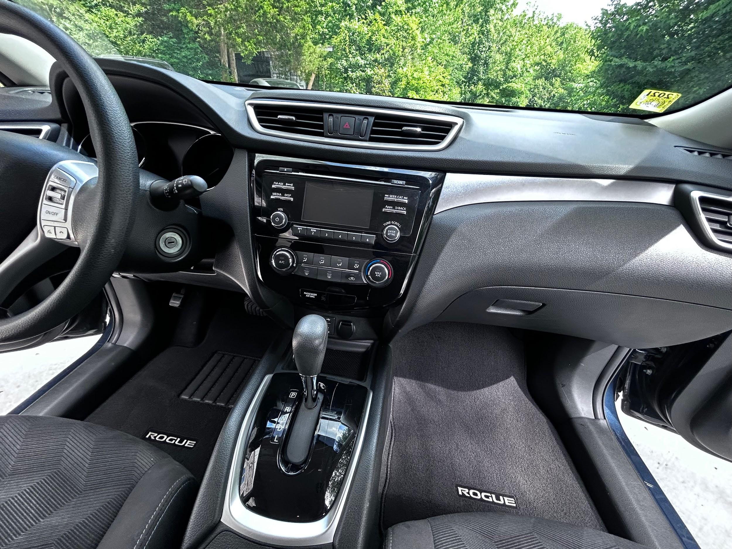 Nissan Rogue dashboard and center console after detailing