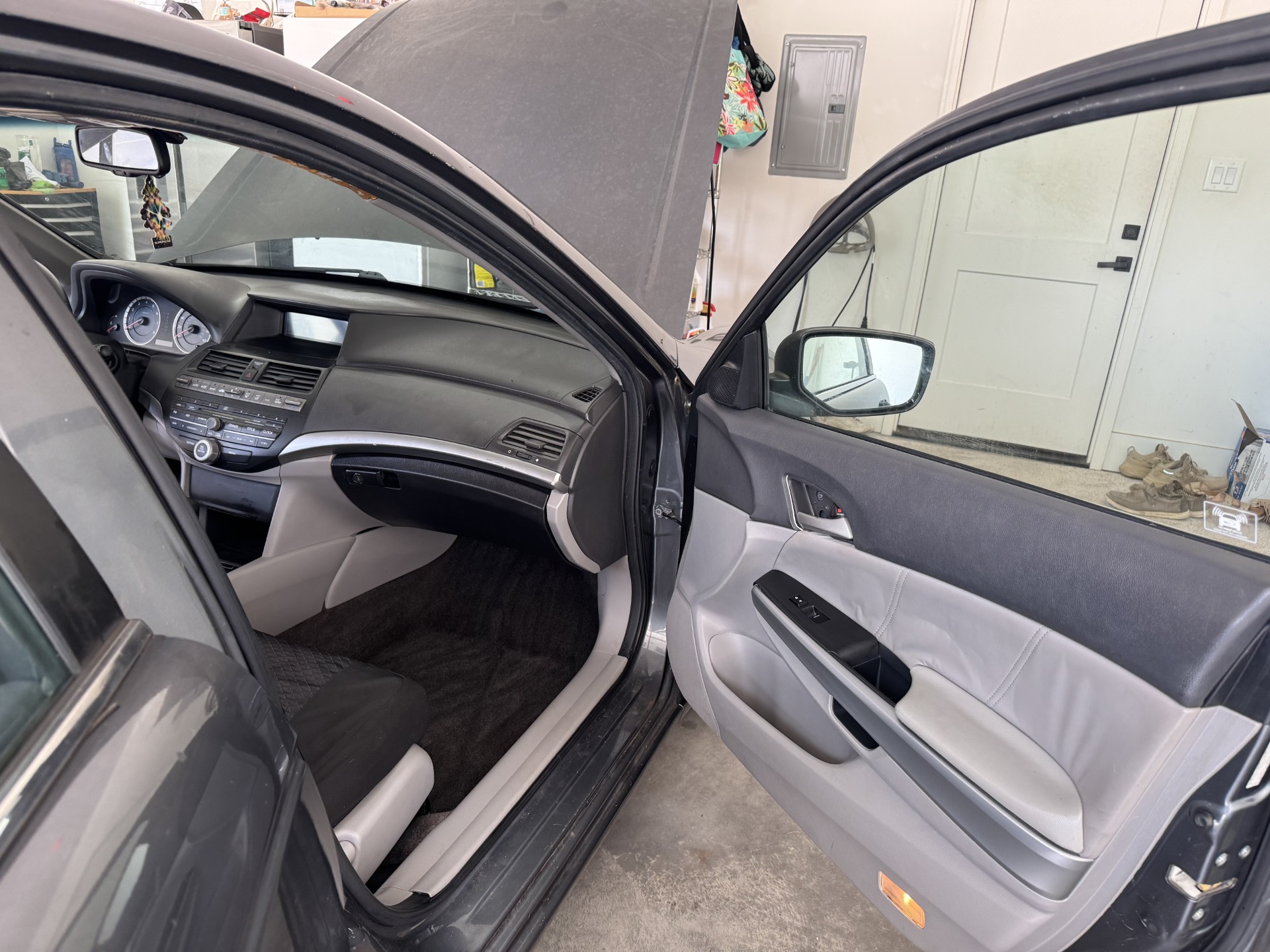 Honda Accord door panel, jamb and front carpet clean after detailing