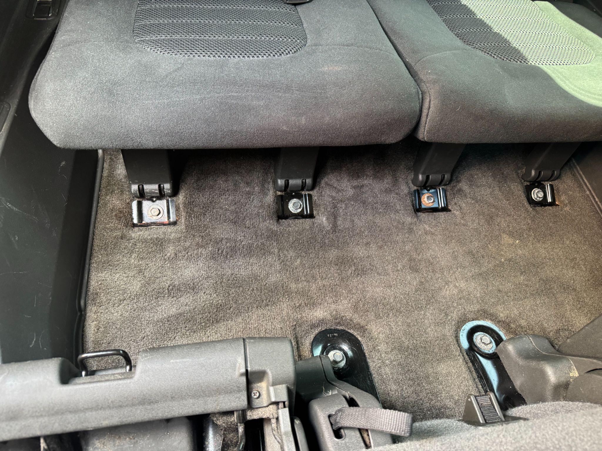 Nissan Pathfinder rear floor cleaned after detailing