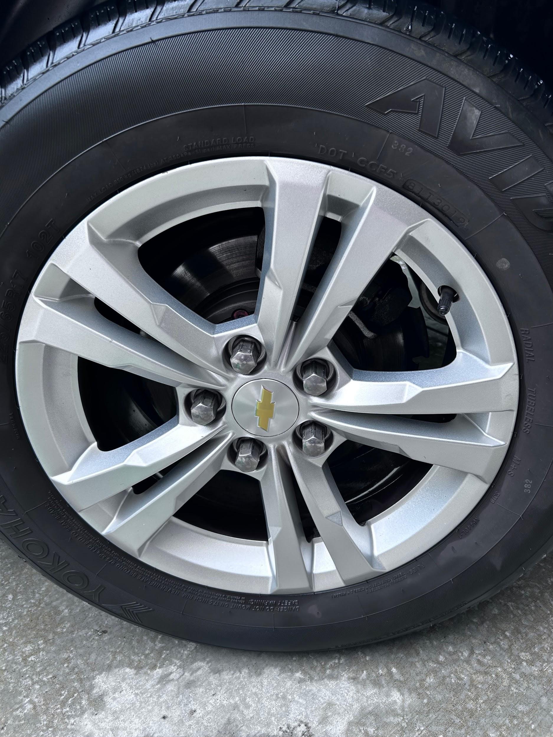 Chevrolet Equinox wheel cleaned and dressed after detailing