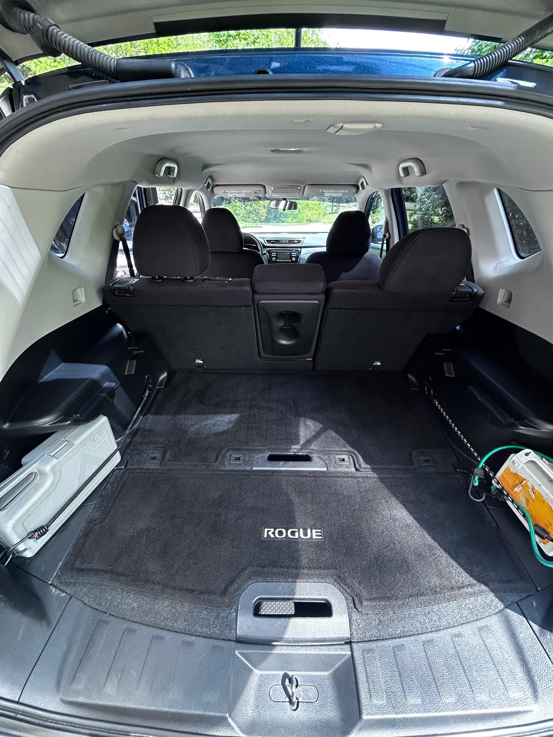Nissan Rogue cargo area vacuumed and cleaned