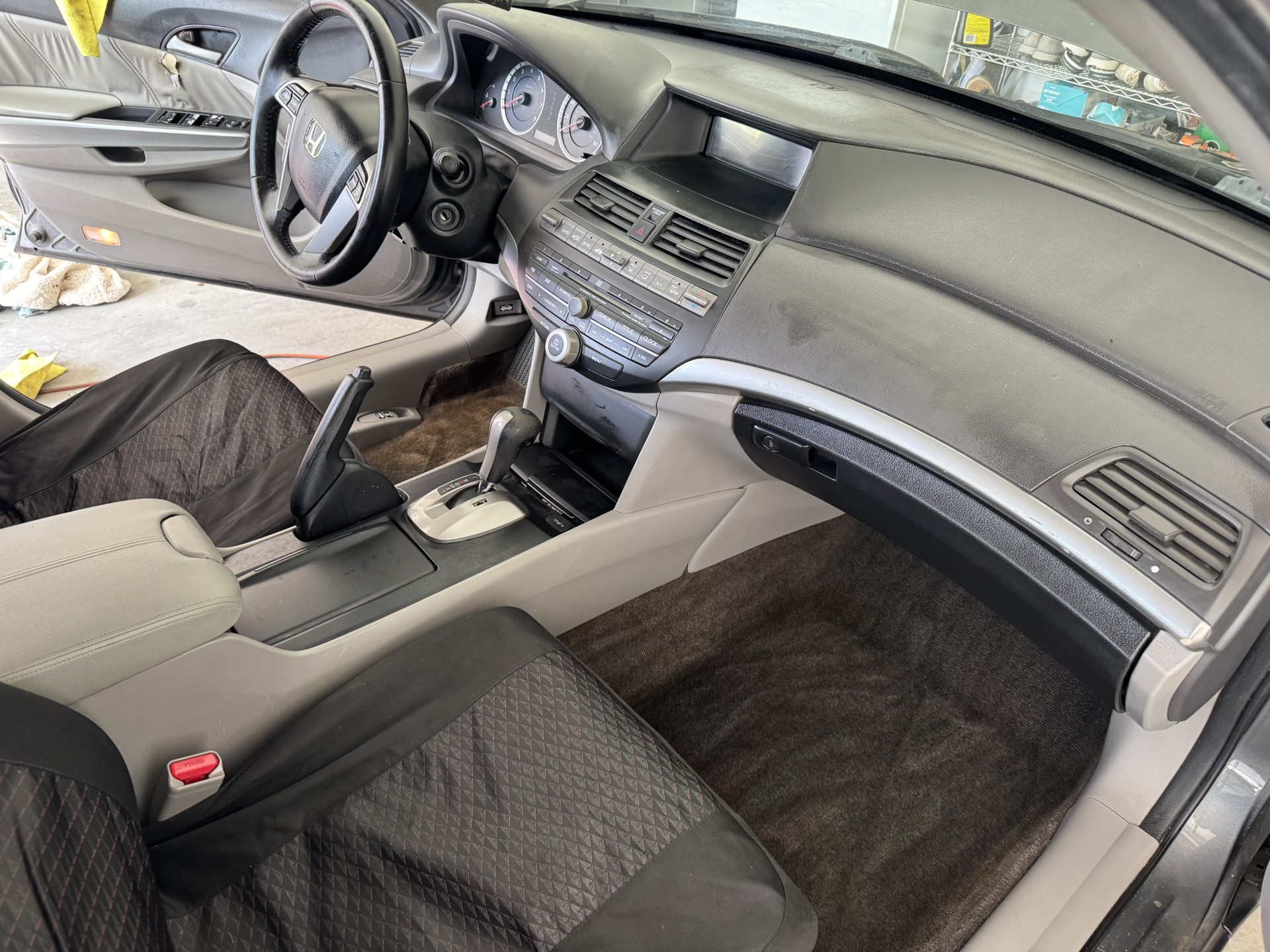 Honda Accord front seats, dash and carpet spotless after detailing
