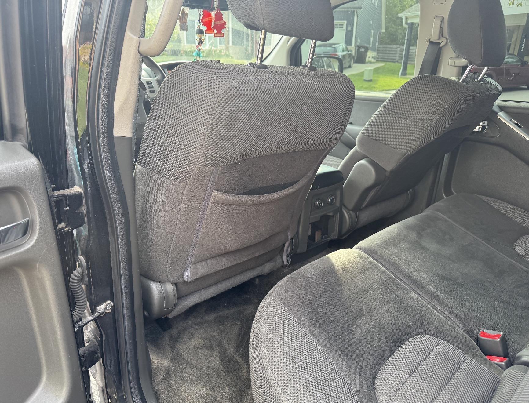 Nissan Pathfinder middle row seats and carpet cleaned after detailing