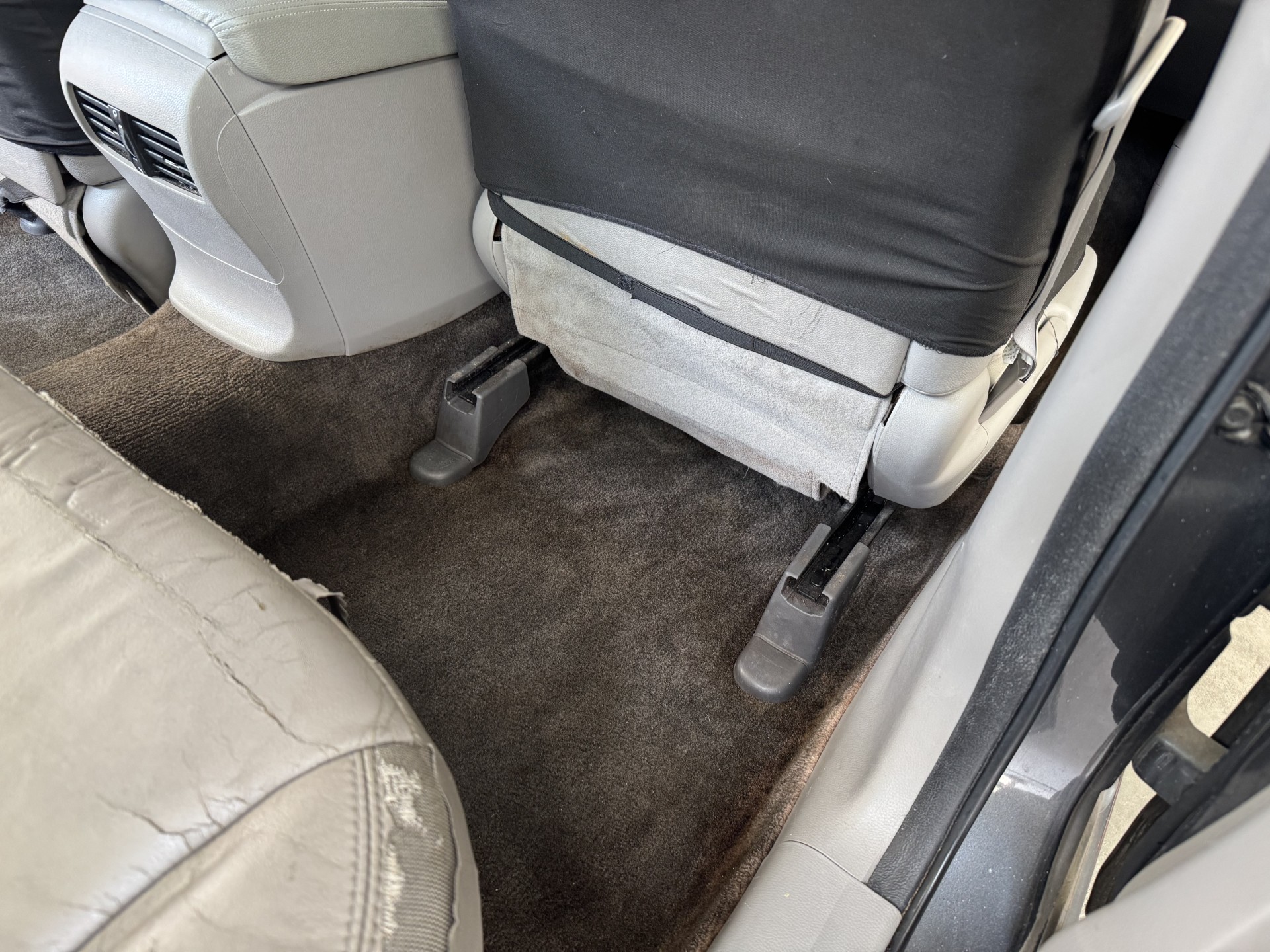 Honda Accord rear passenger floor vacuumed and shampooed after cleaning